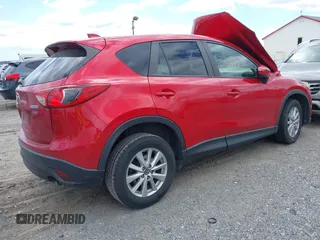 2015 Mazda CX-5 Touring with VIN JM3KE4CY7F0492559, listed as a IAAI auction lot 42053447 with 95,675 mi miles. Bid and sale history available at carsss.com. Image 4.