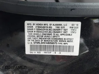 2010 Honda Odyssey Touring with VIN 5FNRL3H97AB056975, listed as a IAAI auction lot 42169269 with 183,483 mi miles. Bid and sale history available at carsss.com. Image 9.