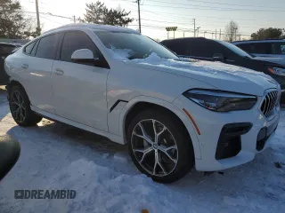 2022 BMW X6 xDrive40i with VIN 5UXCY6C08N9K10724, listed as a Copart auction lot 88091075 with 30,825 mi miles and Salvage Title. Bid and sale history available at carsss.com. Image 4.