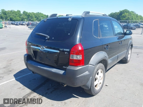 2005 Hyundai Tucson GLS with VIN KM8JN72D95U193338, listed as a IAAI auction lot 42205240 with 172,424 mi miles. Bid and sale history available at carsss.com. Image 4.