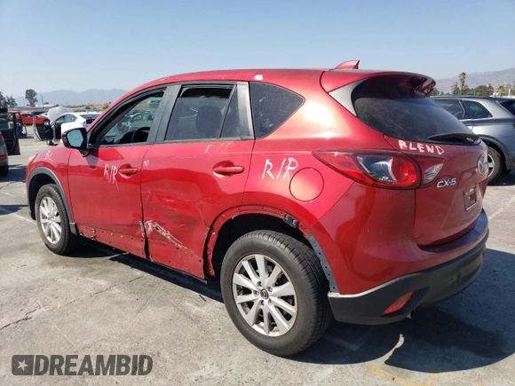 2014 Mazda CX-5 Touring with VIN JM3KE2CY9E0356050, listed as a Copart auction lot 65470674 with 70,400 mi miles and Salvage Title. Bid and sale history available at DreamBid. Image 2.