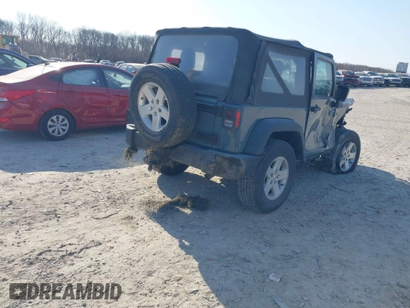 2014 Jeep Wrangler Sport with VIN 1C4AJWAG5EL271318, listed as a IAAI auction lot 41780040 with 128,942 mi miles and . Bid and sale history available at DreamBid. Image 4.