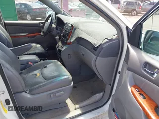2010 Toyota Sienna XLE with VIN 5TDYK4CC7AS291119, listed as a IAAI auction lot 41742917 with 201,590 mi miles. Bid and sale history available at carsss.com. Image 5.