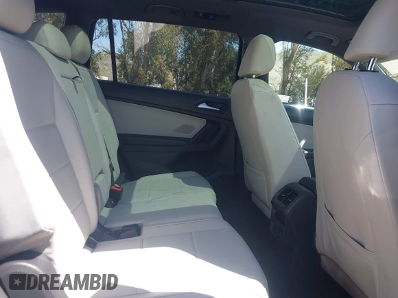 2021 Volkswagen Tiguan SE with VIN 3VV3B7AX0MM015825, listed as a IAAI auction lot 41955268 with 57,909 mi miles and . Bid and sale history available at DreamBid. Image 8.