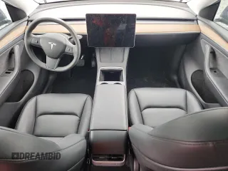 2024 Tesla Model Y Long Range with VIN 7SAYGDEE9RA255688, listed as a Copart auction lot 58918665 with 21,302 mi miles and Salvage title. Bid and sale history available at DreamBid. Image 8.