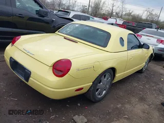 2002 Ford Thunderbird w/Hardtop Premium with VIN 1FAHP60A52Y105685, listed as a IAAI auction lot 41879044 with 116,772 mi miles. Bid and sale history available at carsss.com. Image 4.