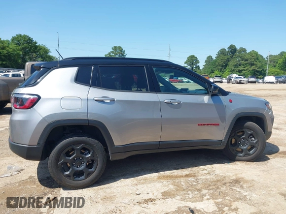 2023 Jeep Compass Trailhawk with VIN 3C4NJDDN3PT527995, listed as a IAAI auction lot 42218464 with 47,701 mi miles and . Bid and sale history available at DreamBid. Image 13.