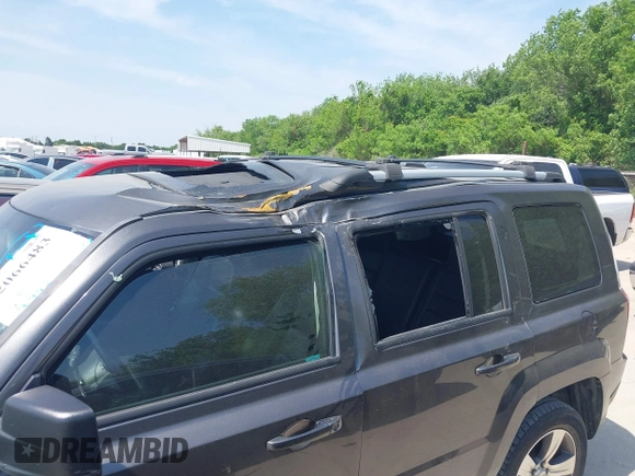 2016 Jeep Patriot Latitude with VIN 1C4NJRFB7GD658594, listed as a IAAI auction lot 42066483 with 146,492 mi miles. Bid and sale history available at carsss.com. Image 6.