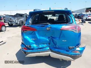 2018 Toyota RAV4 XLE with VIN JTMWFREV2JJ168557, listed as a IAAI auction lot 41994837 with 107,636 mi miles. Bid and sale history available at carsss.com. Image 16.
