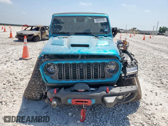 2024 Jeep Wrangler Rubicon X with VIN 1C4RJXFG1RW180410, listed as a Copart auction lot 58039785 with 3,381 mi miles and Salvage title. Bid and sale history available at DreamBid. Image 5.