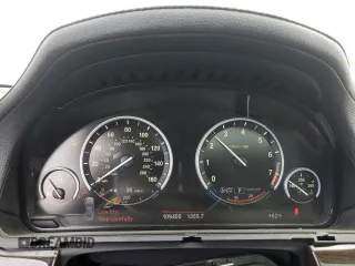 2013 BMW 7 Series 750i with VIN WBAYA8C57DC996498, listed as a Copart auction lot 52907415 with 109,405 mi miles and Salvage Title. Bid and sale history available at DreamBid. Image 9.