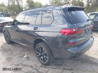 2021 BMW X7 xDrive40i with VIN 5UXCW2C05M9F76009, listed as a IAAI auction lot 41681992 with 48,565 mi miles. Bid and sale history available at carsss.com. Image 3.