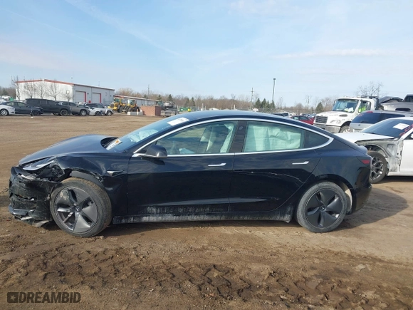 2019 Tesla Model 3 Long Range with VIN 5YJ3E1EB5KF414748, listed as a IAAI auction lot 41778914 with 0 mi miles. Bid and sale history available at carsss.com. Image 14.