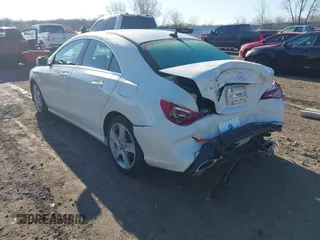 2018 Mercedes-Benz CLA 250 with VIN WDDSJ4GB8JN614616, listed as a IAAI auction lot 42059733 with 69,069 mi miles and . Bid and sale history available at DreamBid. Image 3.