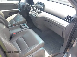 2010 Honda Odyssey EX with VIN 5FNRL3H42AB110879, listed as a IAAI auction lot 42257313 with 197,190 mi miles and . Bid and sale history available at DreamBid. Image 5.