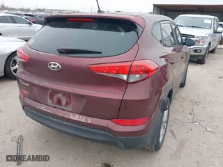 2016 Hyundai Tucson SE with VIN KM8J23A4XGU041915, listed as a IAAI auction lot 41573038 with 101,937 mi miles. Bid and sale history available at carsss.com. Image 4.