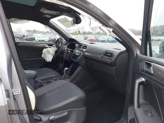 2023 Volkswagen Tiguan SE R-Line Black with VIN 3VV8B7AX3PM130610, listed as a IAAI auction lot 42011131 with 21,980 mi miles and . Bid and sale history available at DreamBid. Image 5.