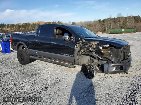 2016 Nissan Titan Platinum Reserve z VIN 1N6BA1F28GN508716, wystawiony jako Copart lot #46797225 z przebiegiem 168 572 mil mil oraz Szkoda całkowita • Salvage title. Historia ofert i sprzedaży dostępna na DreamBid. Obrazek 4.
