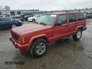 1999 Jeep Cherokee Sport with VIN 1J4FT68S1XL601799, listed as a Copart auction lot 83881844 with 203,572 mi miles and Salvage Title. Bid and sale history available at carsss.com. Image 1.