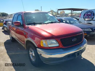 2002 Ford F-150 XLT with VIN 1FTRW07L72KB33948, listed as a IAAI auction lot 41869056 with 0 mi miles. Bid and sale history available at carsss.com. Image 1.