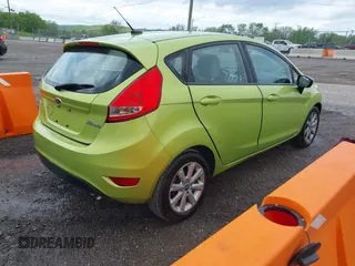 2013 Ford Fiesta SE with VIN 3FADP4EJ7DM136723, listed as a IAAI auction lot 42090284 with 168,004 mi miles and . Bid and sale history available at DreamBid. Image 4.
