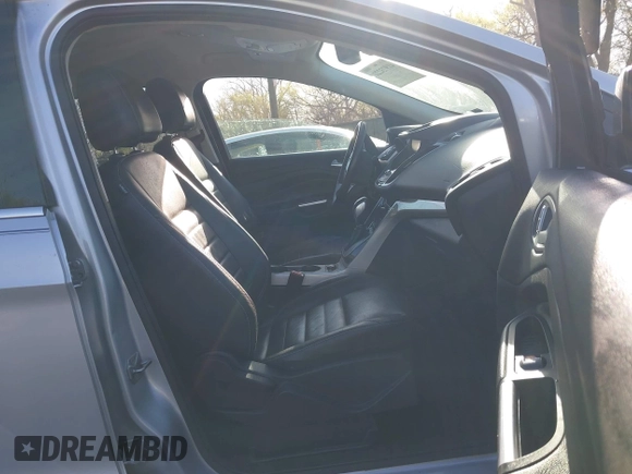 2013 Ford Escape SEL with VIN 1FMCU0HX4DUB98238, listed as a IAAI auction lot 41973221 with 131,590 mi miles and . Bid and sale history available at DreamBid. Image 5.