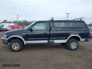 1998 Ford F-150 Standard with VIN 1FTZF18W0WNC16138, listed as a IAAI auction lot 41688951 with 354,669 mi miles. Bid and sale history available at carsss.com. Image 14.