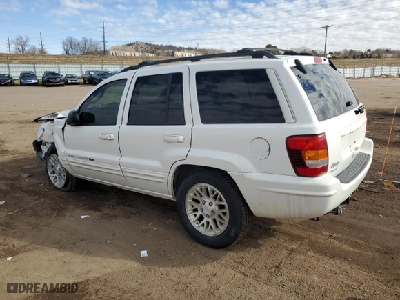 2004 Jeep Grand Cherokee Limited with VIN 1J4GW58N74C142578, listed as a Copart auction lot 43137315 with 93,934 mi miles and Salvage Title. Bid and sale history available at carsss.com. Image 2.