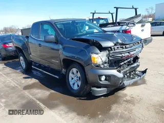 2016 GMC Canyon z VIN 1GTH5CE36G1180209, wystawiony jako IAAI lot #41604746 z przebiegiem 112 963 mil mil oraz . Historia ofert i sprzedaży dostępna na DreamBid. Obrazek 1.