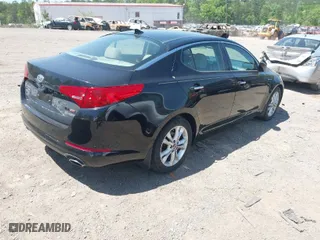 2011 Kia Optima EX with VIN KNAGN4A71B5139155, listed as a IAAI auction lot 42048976 with 130,400 mi miles. Bid and sale history available at carsss.com. Image 4.