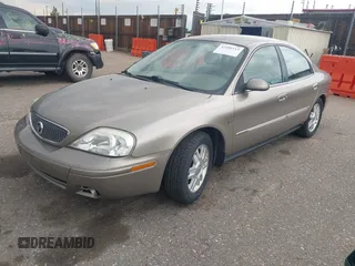 2005 Mercury Sable LS z VIN 1MEFM55S85A605535, wystawiony jako IAAI lot #42490113 z przebiegiem 112 031 mil mil oraz . Historia ofert i sprzedaży dostępna na DreamBid. Obrazek 2.