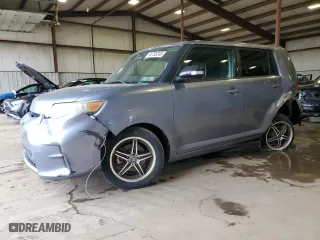 2011 Scion xB with VIN JTLZE4FE2B1119768, listed as a Copart auction lot 50708245 with 165,700 mi miles and Salvage Title. Bid and sale history available at carsss.com. Image 1.