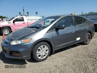 2012 Honda Insight z VIN JHMZE2H34CS003929, wystawiony jako Copart lot #52707885 z przebiegiem 131 596 mil mil oraz Szkoda całkowita • Salvage title. Historia ofert i sprzedaży dostępna na DreamBid. Obrazek 1.