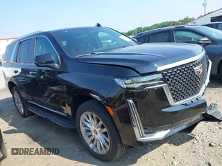 2023 Cadillac Escalade 4WD Premium Luxury with VIN 1GYS4BKL1PR359566, listed as a IAAI auction lot 42586485 with 48,235 mi miles and . Bid and sale history available at DreamBid. Image 1.