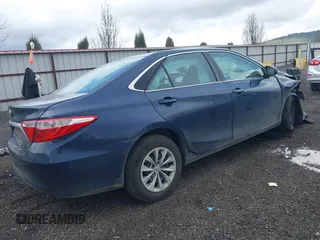 2016 Toyota Camry XLE with VIN 4T4BF1FK6GR519063, listed as a IAAI auction lot 41939684 with 162,544 mi miles. Bid and sale history available at carsss.com. Image 4.