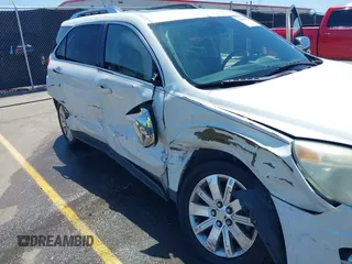 2011 Chevrolet Equinox 2LT z VIN 2CNFLPE50B6394569, wystawiony jako IAAI lot #42008653 z przebiegiem 238 617 mil mil oraz . Historia ofert i sprzedaży dostępna na DreamBid. Obrazek 6.