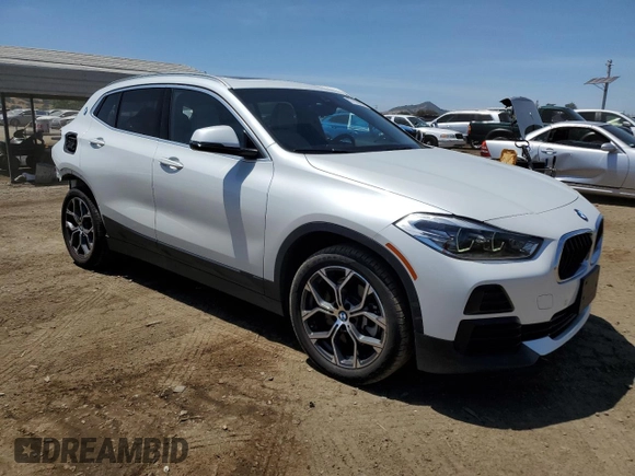 2023 BMW X2 sDrive28i z VIN WBXYH9C06P5V65784, wystawiony jako Copart lot #57108985 z przebiegiem 37 113 mil mil oraz Szkoda całkowita • Salvage title. Historia ofert i sprzedaży dostępna na DreamBid. Obrazek 4.