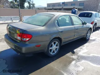 2003 Infiniti I35 Luxury with VIN JNKDA31A23T104434, listed as a IAAI auction lot 41821043 with 146,903 mi miles. Bid and sale history available at carsss.com. Image 4.
