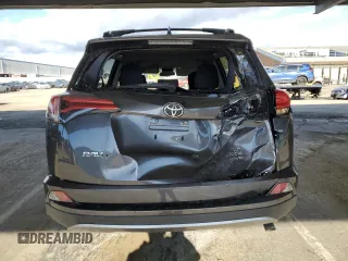 2018 Toyota RAV4 XLE with VIN JTMRFREV5JJ739620, listed as a Copart auction lot 48218185 with 82,885 mi miles and Salvage Title. Bid and sale history available at DreamBid. Image 6.
