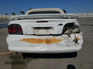 1998 Ford Mustang with VIN 1FAFP4448WF269580, listed as a Copart auction lot 54861155 with 304,869 mi miles and Salvage title. Bid and sale history available at DreamBid. Image 6.