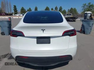 2021 Tesla Model Y Long Range with VIN 5YJYGDEEXMF280480, listed as a IAAI auction lot 41993633 with 69,579 mi miles. Bid and sale history available at carsss.com. Image 17.