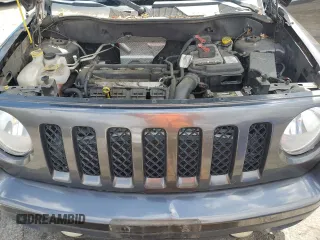 2014 Jeep Patriot Altitude z VIN 1C4NJPBA7ED894466, wystawiony jako Copart lot #54675025 z przebiegiem 110 716 mil mil oraz Szkoda całkowita • Salvage title. Historia ofert i sprzedaży dostępna na DreamBid. Obrazek 11.