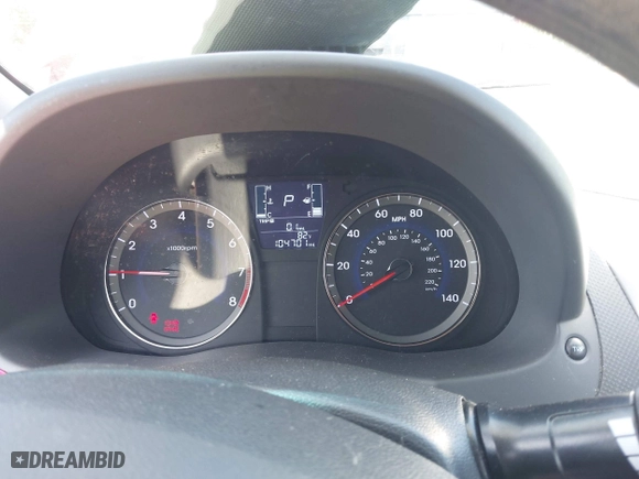 2015 Hyundai Accent GLS with VIN KMHCT4AE1FU801913, listed as a IAAI auction lot 42035825 with 104,701 mi miles. Bid and sale history available at carsss.com. Image 7.