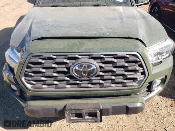 2021 Toyota Tacoma SR z VIN 3TYSZ5AN0MT035649, wystawiony jako Copart lot #75679984 z przebiegiem Nie podano mil oraz Szkoda całkowita • Salvage title. Historia ofert i sprzedaży dostępna na DreamBid. Obrazek 11.