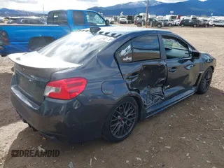 2015 Subaru WRX with VIN JF1VA1A65F9818409, listed as a IAAI auction lot 40895247 with 73,273 mi miles. Bid and sale history available at carsss.com. Image 4.