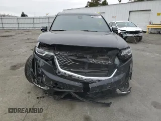 2022 Cadillac XT6 Premium Luxury with VIN 1GYKPDRS5NZ110989, listed as a Copart auction lot 69600894 with 56,148 mi miles and Salvage Title. Bid and sale history available at carsss.com. Image 5.