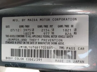2013 Mazda 3 i Sport with VIN JM1BL1U76D1702885, listed as a IAAI auction lot 42152806 with 139,041 mi miles and . Bid and sale history available at DreamBid. Image 10.