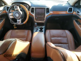 2013 Jeep Grand Cherokee Overland with VIN 1C4RJFCTXDC525097, listed as a Copart auction lot 42250875 with 214,368 mi miles and Salvage Title. Bid and sale history available at carsss.com. Image 8.