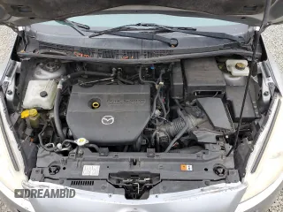 2012 Mazda 5 Grand Touring с VIN JM1CW2DL2C0101833, выставлен на аукционе Copart как лот 60362815 с пробегом 164 556 миль миль и Чистый • Clean title. История ставок и продаж доступна на DreamBid. Изображение 12.