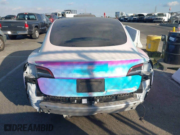 2021 Tesla Model 3 Long Range with VIN 5YJ3E1EB6MF053940, listed as a IAAI auction lot 41344978 with 38,544 mi miles and . Bid and sale history available at DreamBid. Image 16.
